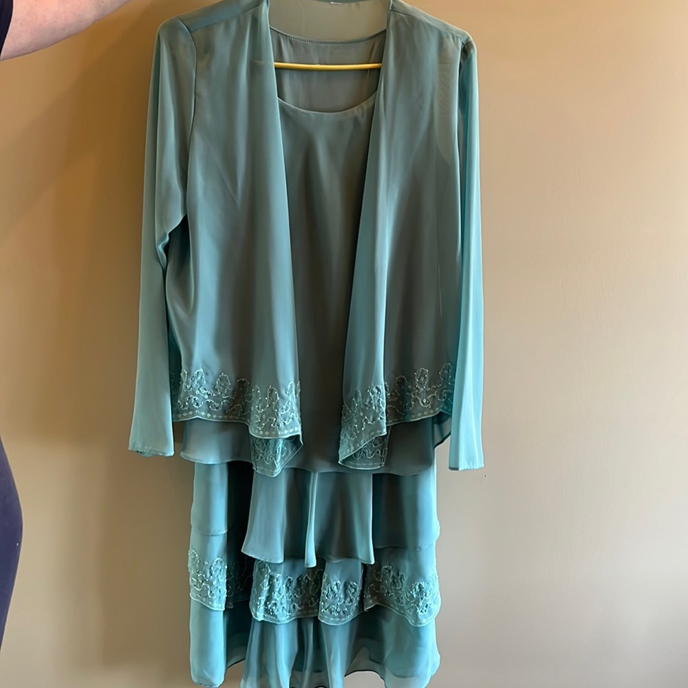 Women’s formal dress with sheer jacket